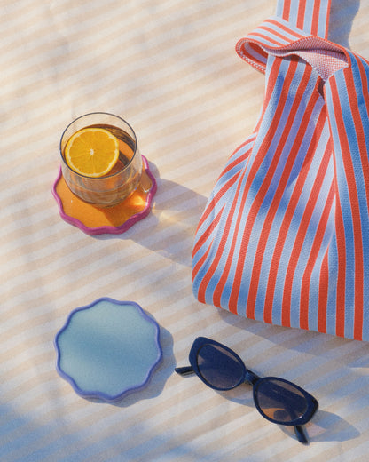 Alkaline Wavy colourful resin drink coaster – Blueberry and Passion Fruit – lifestyle shot