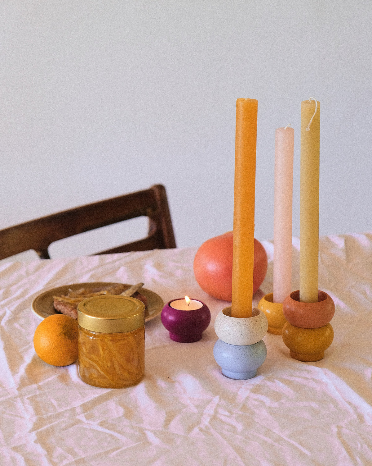 Alkaline stackable resin candle holder – stack of 4 mixed colours – lifestyle