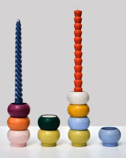 Alkaline stackable resin candle holders – full colour range flat lay