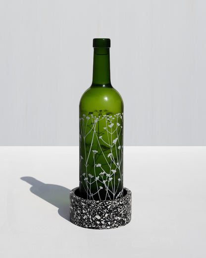 Alkaline round terrazzo resin wine bottle holder – Black – lifestyle table