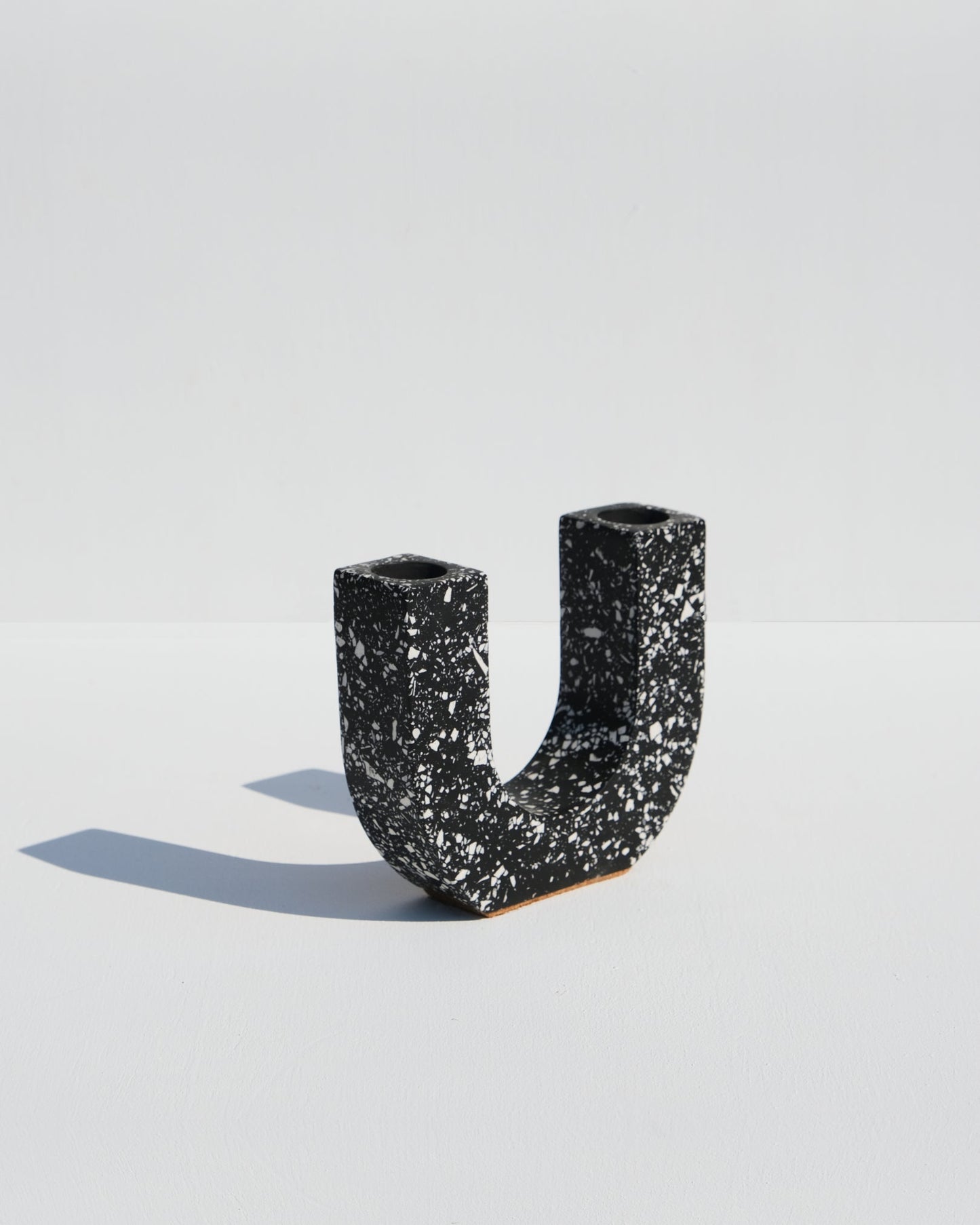 U-Shaped Candle Holder, black terrazzo style