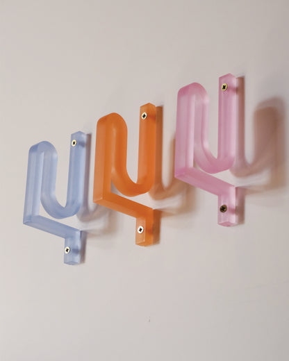 Alkaline Traces frosted resin wall hook – Orange, Blue, & Pink – series installation